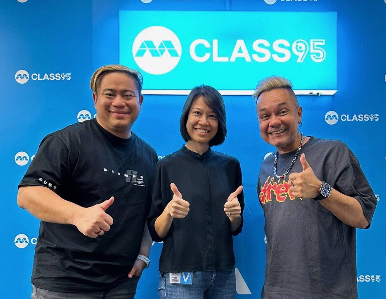 Justin and Vernon, DJs of Muttons in the Morning, posing for a photo with Christina.