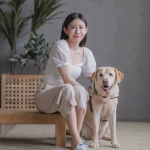 Eloise Tay, Social Worker and guide dog Clare Chia Hong Sen, IT Trainer and Consultant, with his guide dog Clare